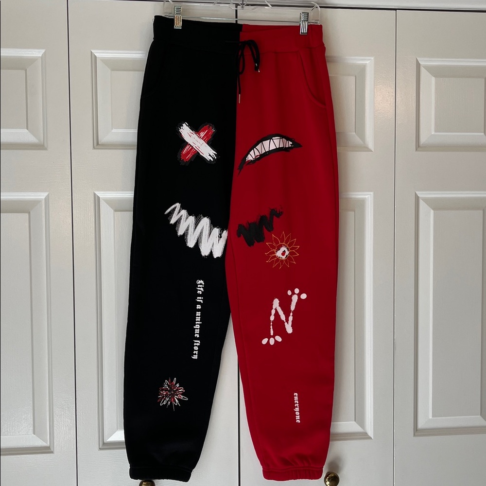 NWOT Men's Manfinity black and red joggers with graphics